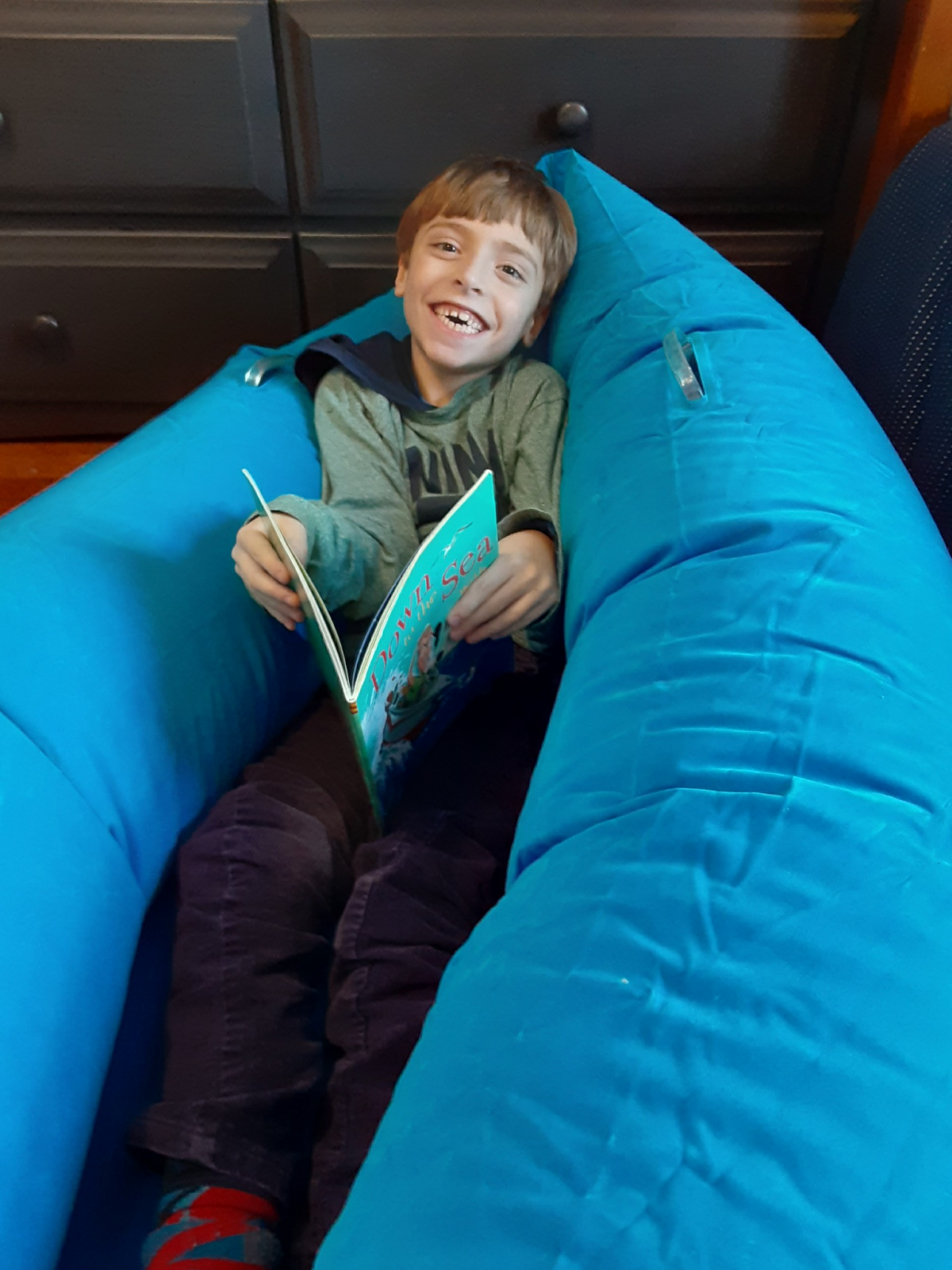 boy-in-cozy-canoe-autism-sensory