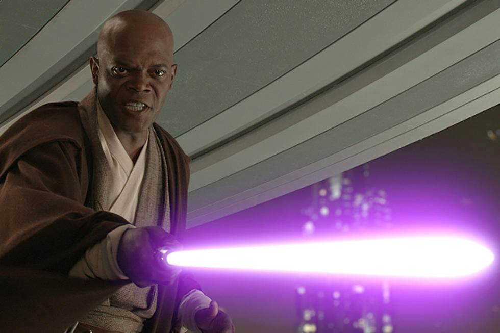 Mace Windu holding his purple light saber