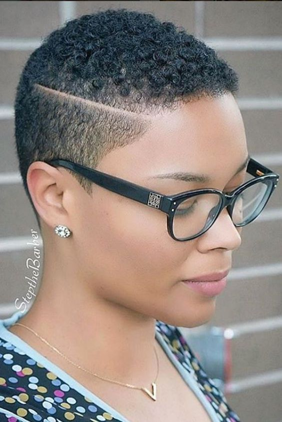 a bespectacled lady on low cut