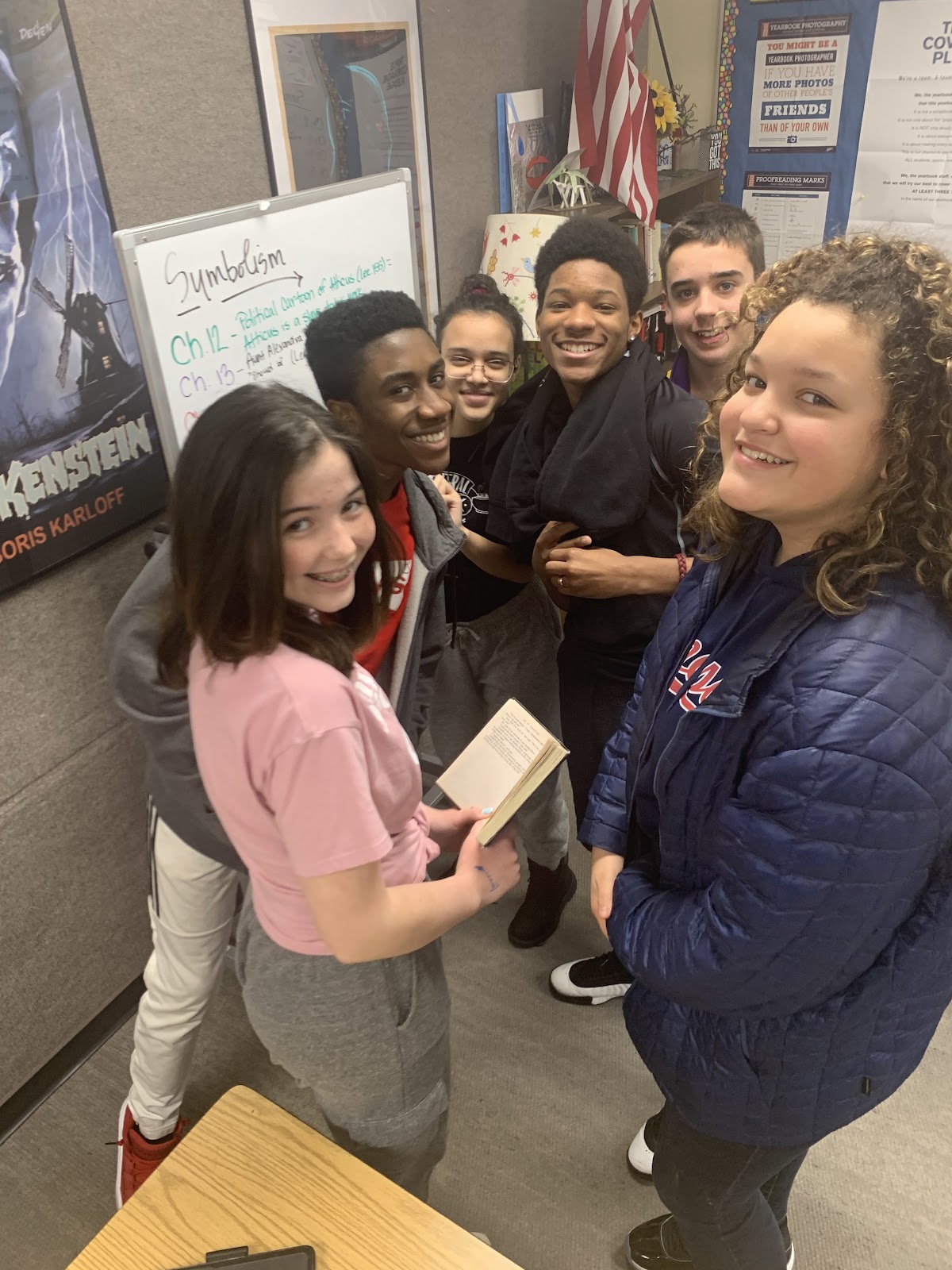 a group of students smiles for the camera