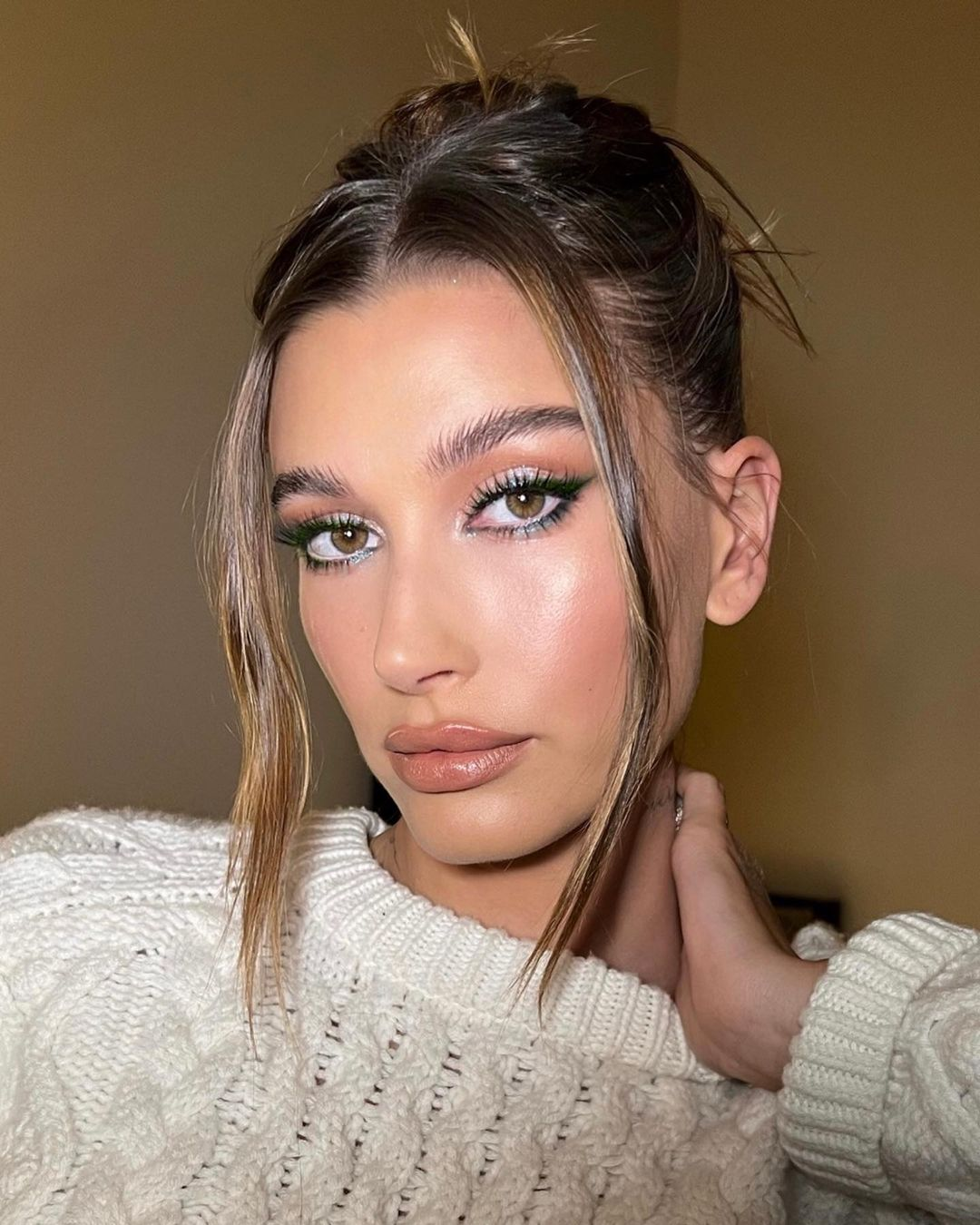 Enhance your hazel eyes with green eyeliner.