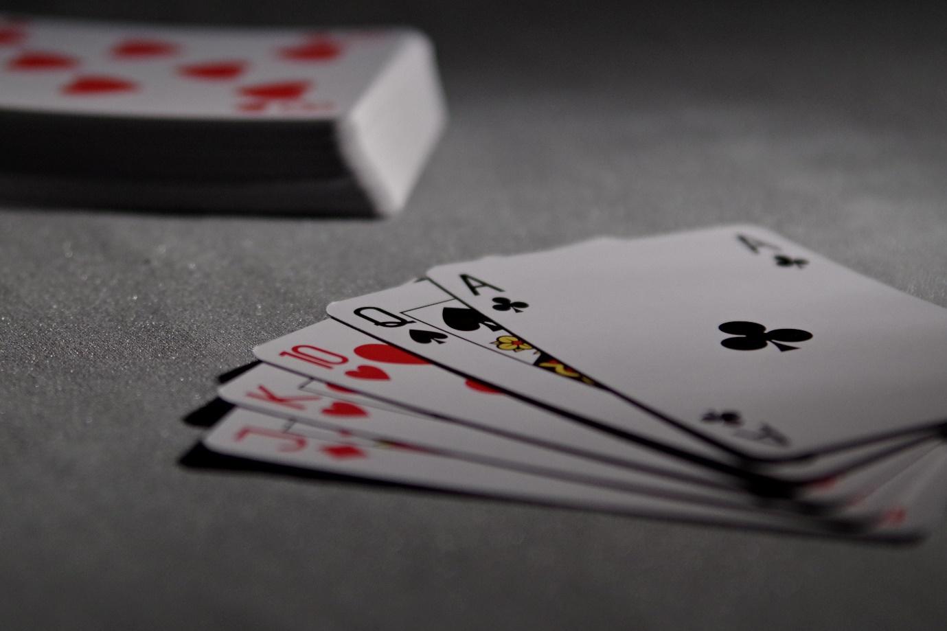 A deck of cards and a deck of cards

Description automatically generated