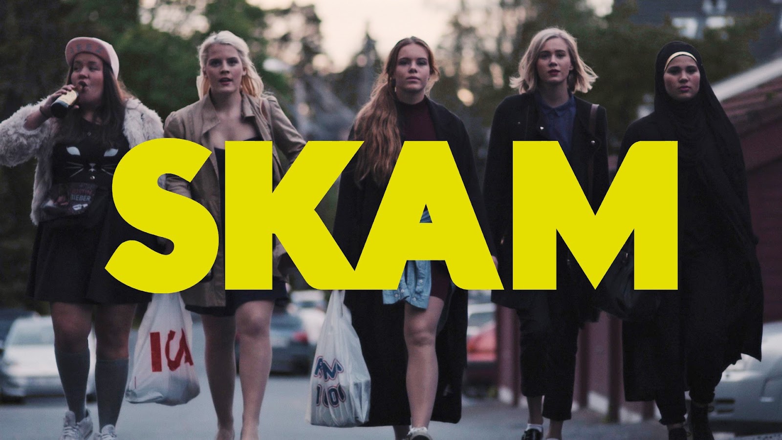 SKAM Norway title card – five teenage girls in modern street clothes, Chris, Vilde, Eva, Noora, and Sana are walking side-by-side down a road. Chris is drinking from a glass bottle, and Vilde and Eva are carrying full plastic bags. Over the image is the text SKAM in bold yellow letters.