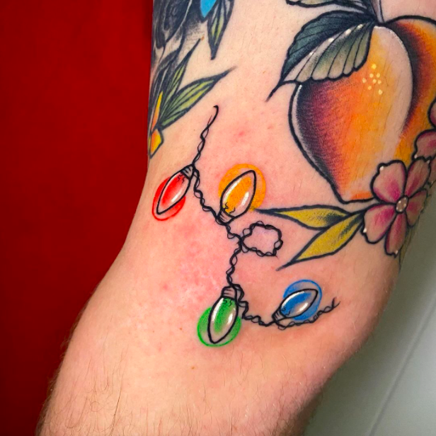 Christmas Lights With Peach Tattoo