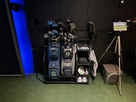 DIY home golf simulator setup golf bag holder