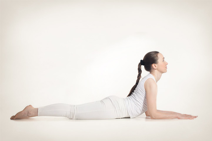 Half cobra pose for improving posture