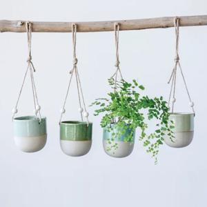 Set of four hanging blue and green stoneware planters photo