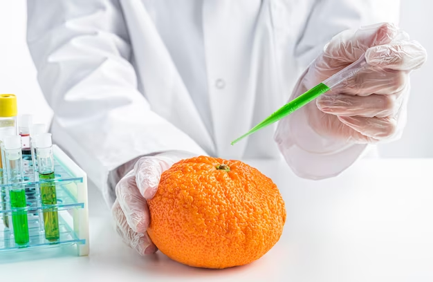 An orange being injected