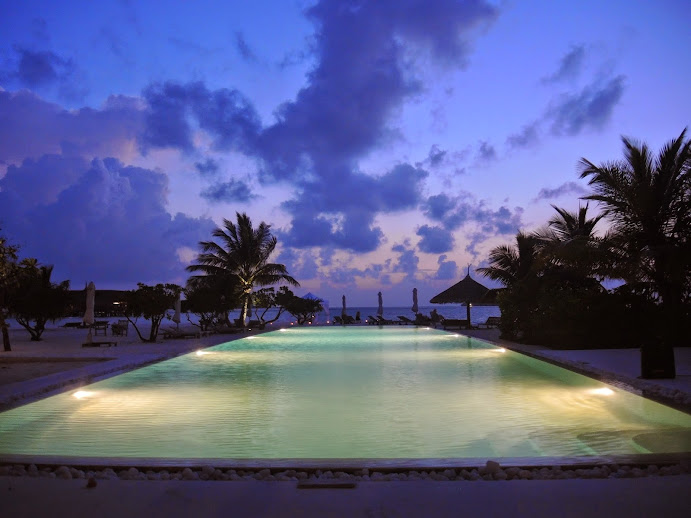 a pool with lights on it