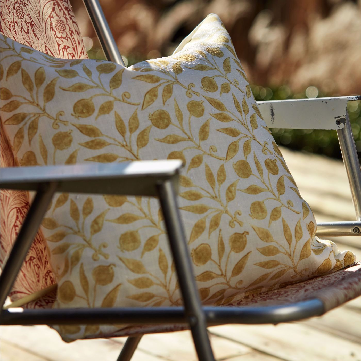 A chair with a pillow sitting on top of it