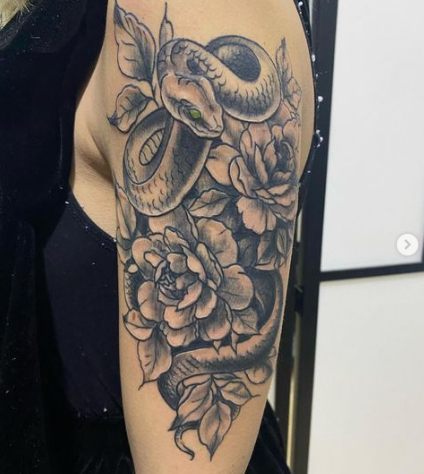 Snake On Flowers Shoulder Tattoo