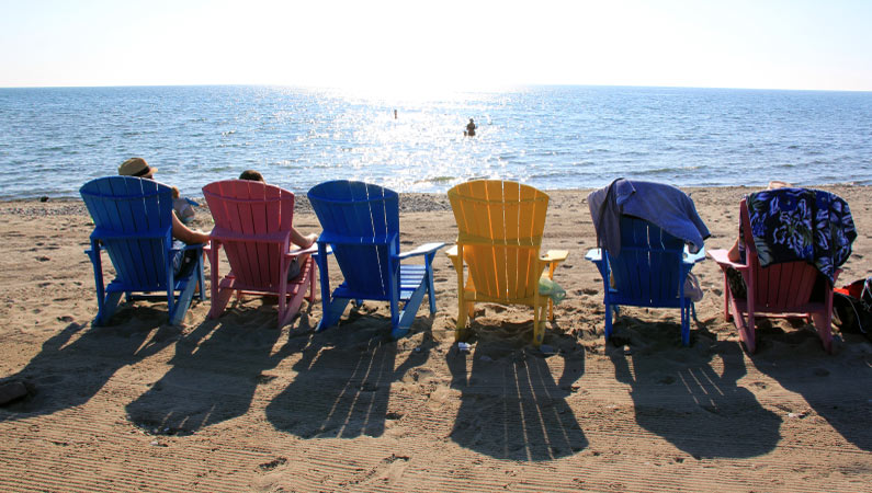 Colorful beach chairs on Woodbine Beach in Toronto