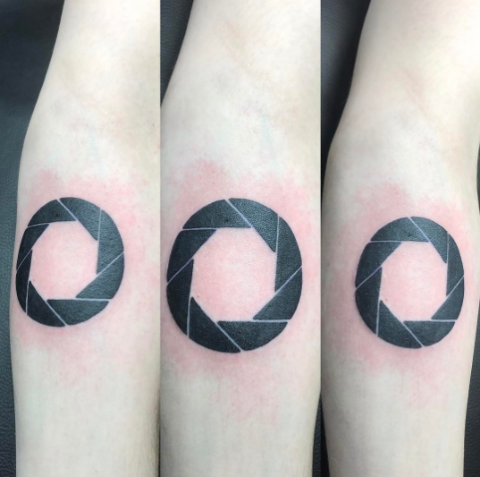 Dark Black Geometric Tattoo