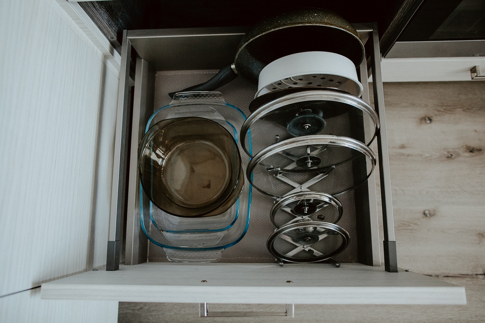 Store pot and pan lids separately in deep drawers