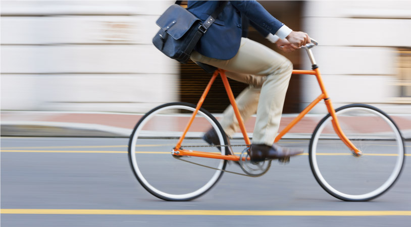 A man riding to work on a bicycle