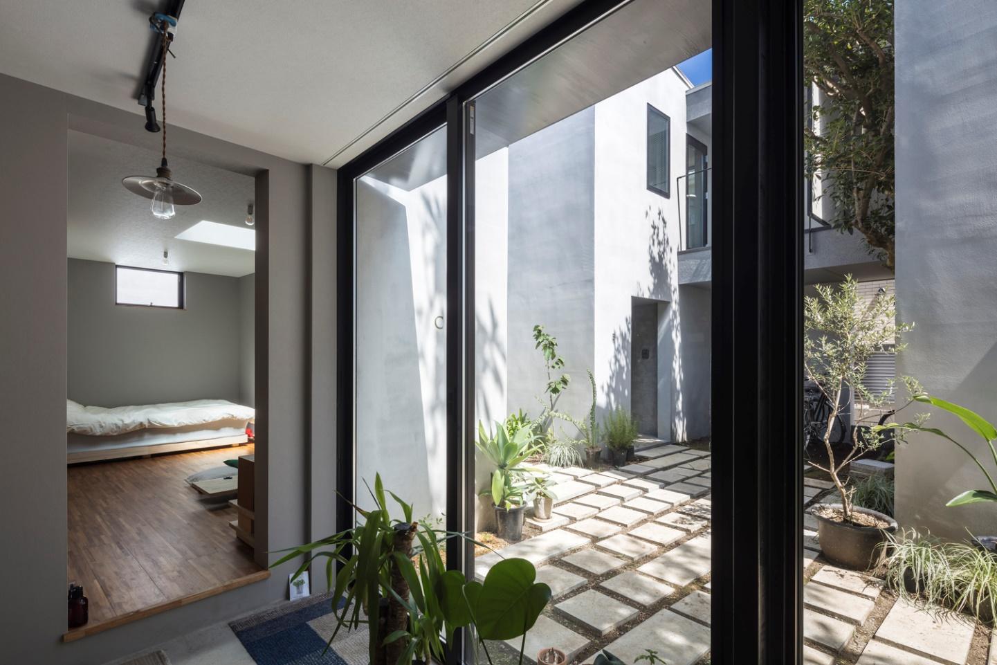 Two Story Concrete House with a Courtyard
