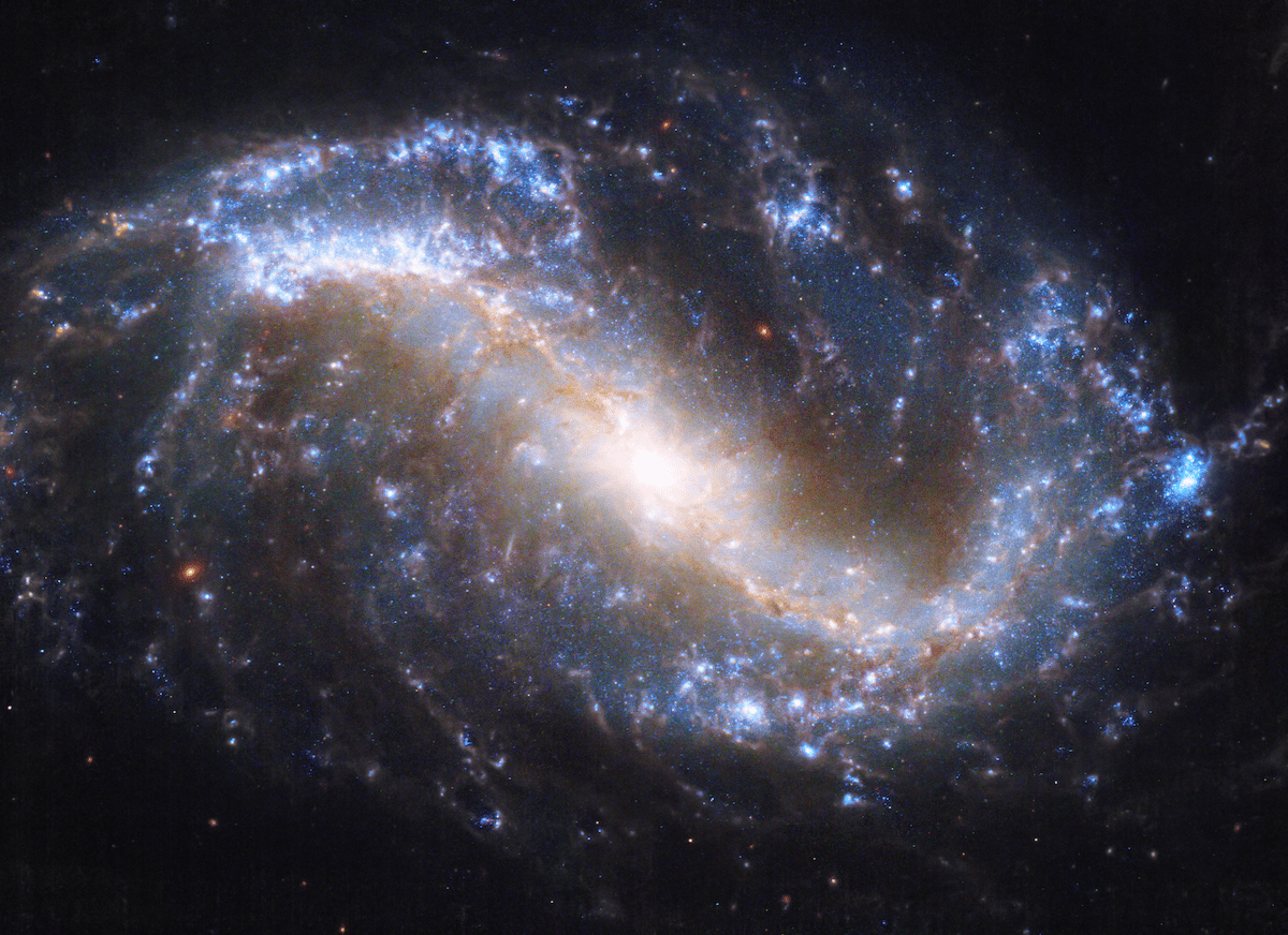 Combo Photo of Spiral Galaxy by Hubble and JWST