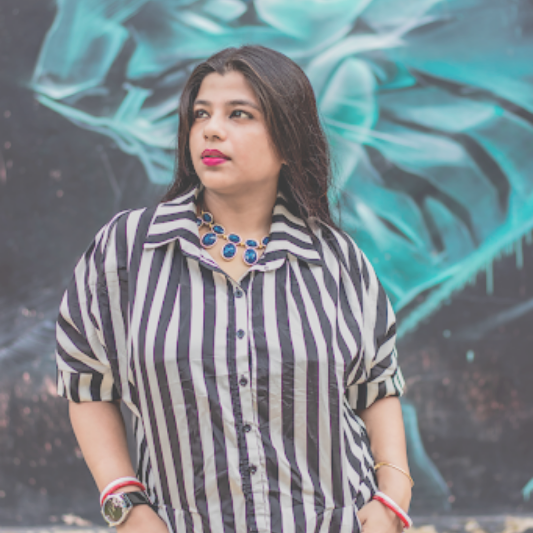 woman in black and white striped shirt dress in Lodhi art district