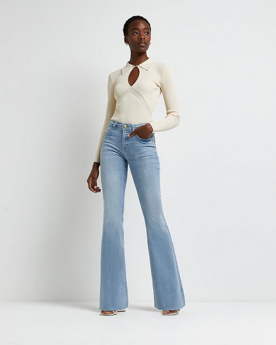 a lady wearing her high-waist flare jeans with a pretty top