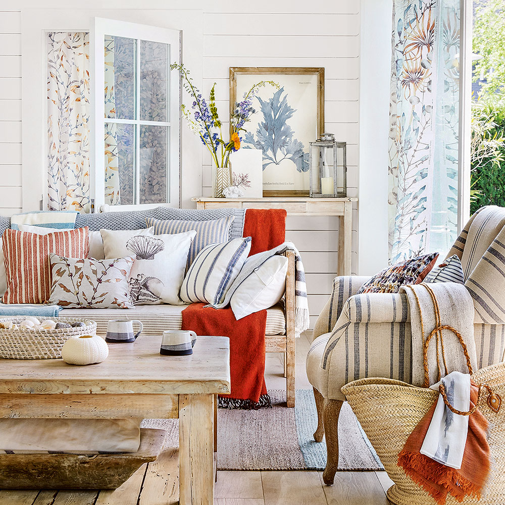 COASTAL-Inspired Living Rooms with distressed or lived-in furniture feel