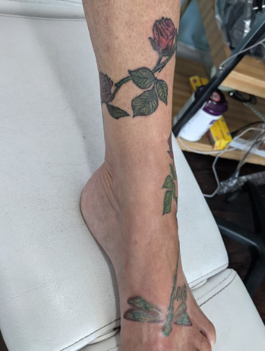 rose vine flower tattoo for leg