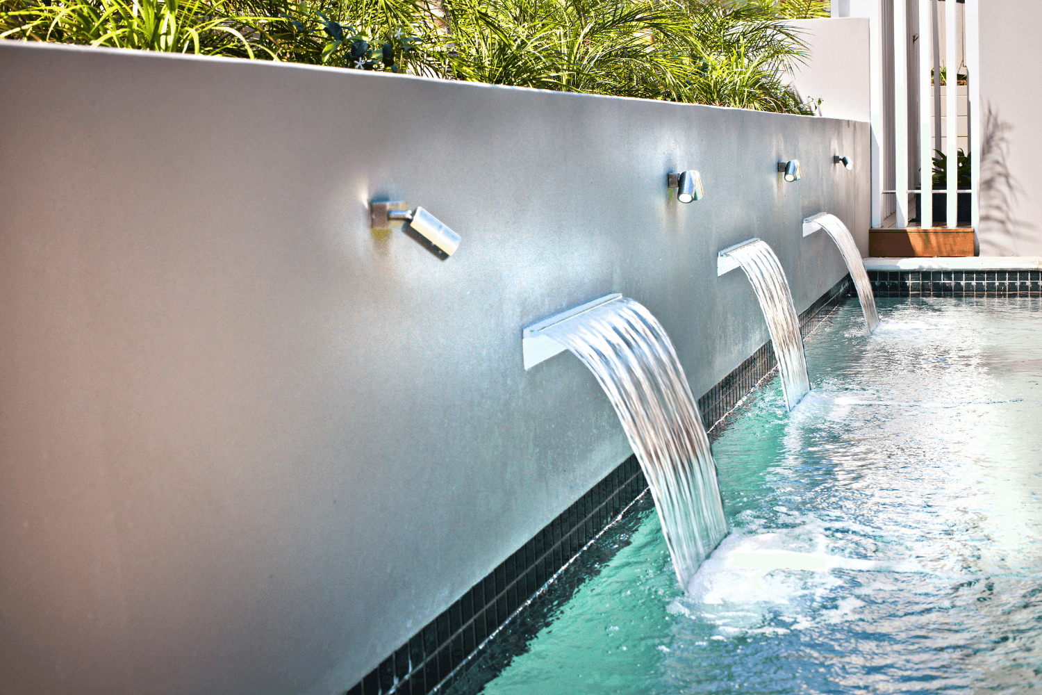 Water feature in a modern swimming pool