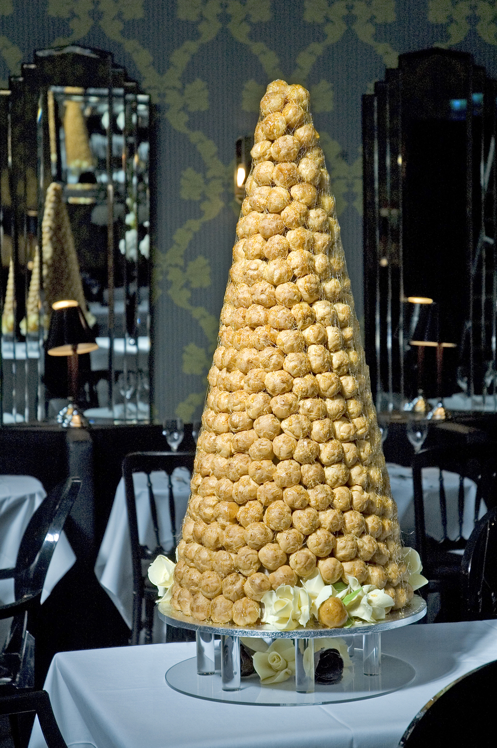 photo of croquembouche tower for wedding cake idea