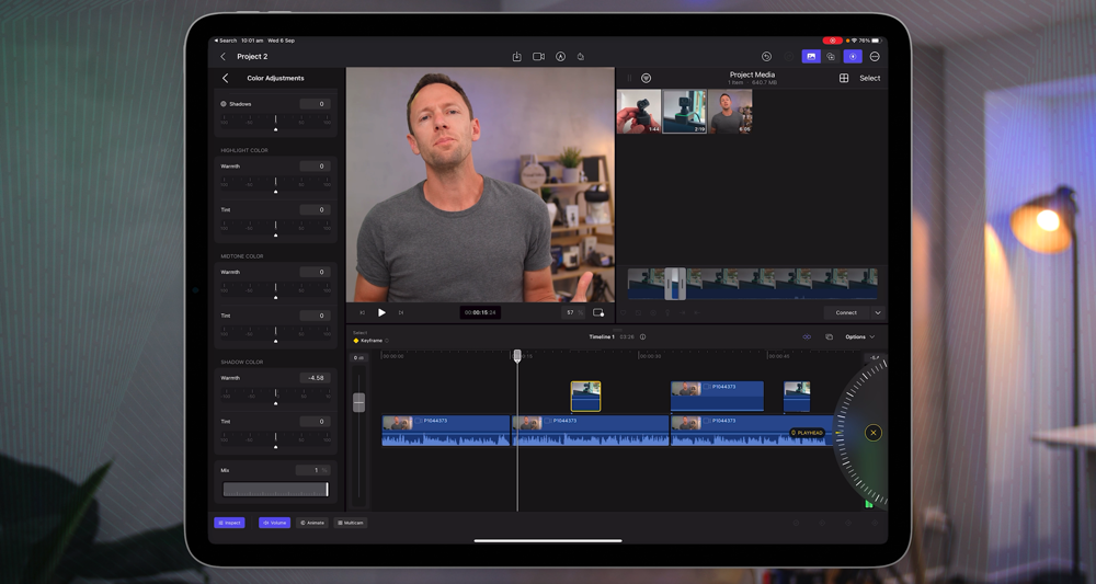 Final Cut Pro for iPad with the Color Adjustments settings open, featuring a jog wheel for controls on the bottom right corner of the iPad screen