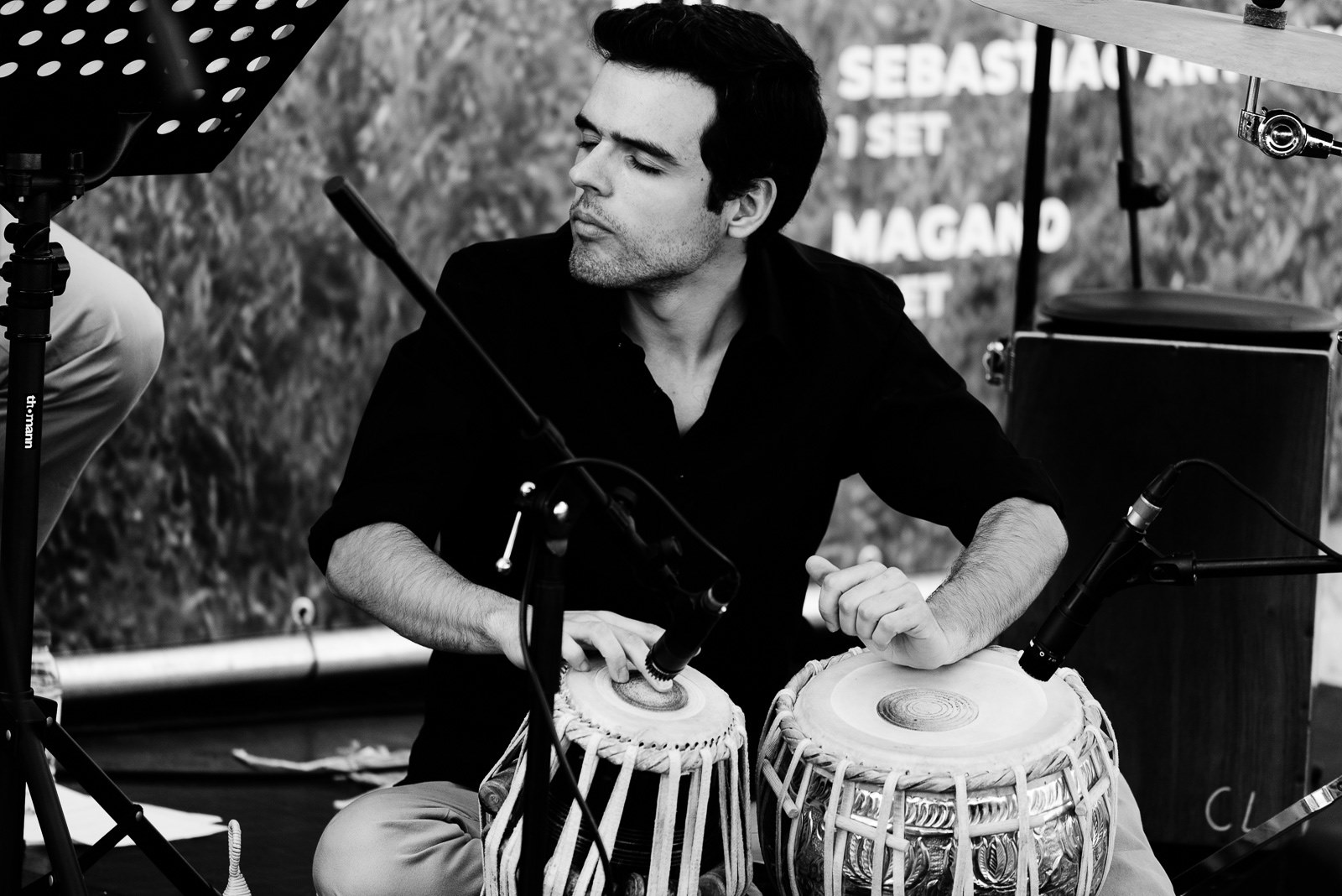 Musiversal's Head of Customer Success Diogo playing percussion
