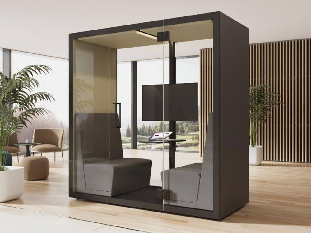 A private meeting booth with acoustic features for effective acoustic management in finance firms to minimise noise and create a focused environment for productive client interactions.