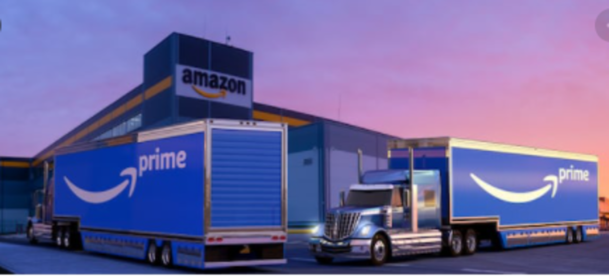 Two trucks with "Amazon Prime" printed on it 