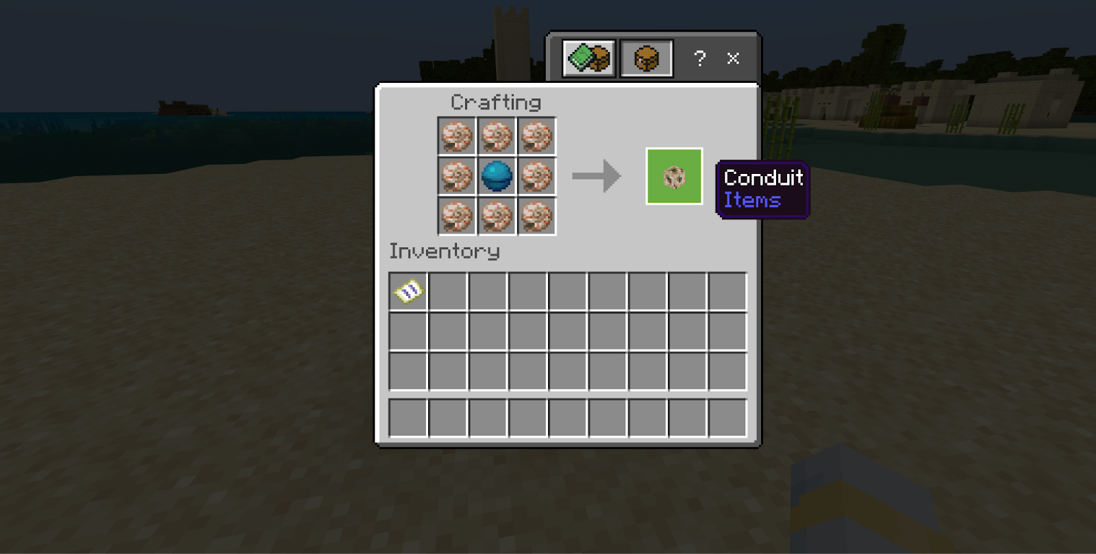 This image demonstrates what the conduit crafting recipe looks like in the crafting table's crafting area.