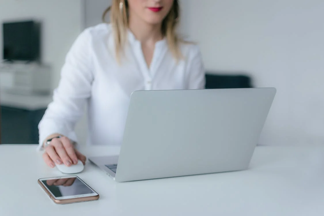 A woman using a laptop