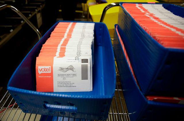Vote-by-mail ballots for the August 4 Washington state primary are pictured at King County Elections in Renton, Washington on August 3, 2020. (Photo by Jason Redmond / AFP) (Photo by JASON REDMOND/AFP via Getty Images)