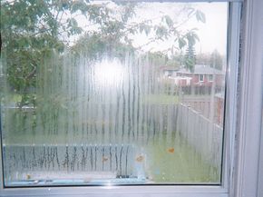Broken IGU forming condensation in a double-glazed window. Source: Pinterest