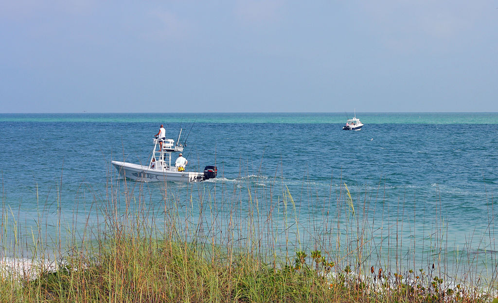 Two boats on the water at Anna Maria Beach. 