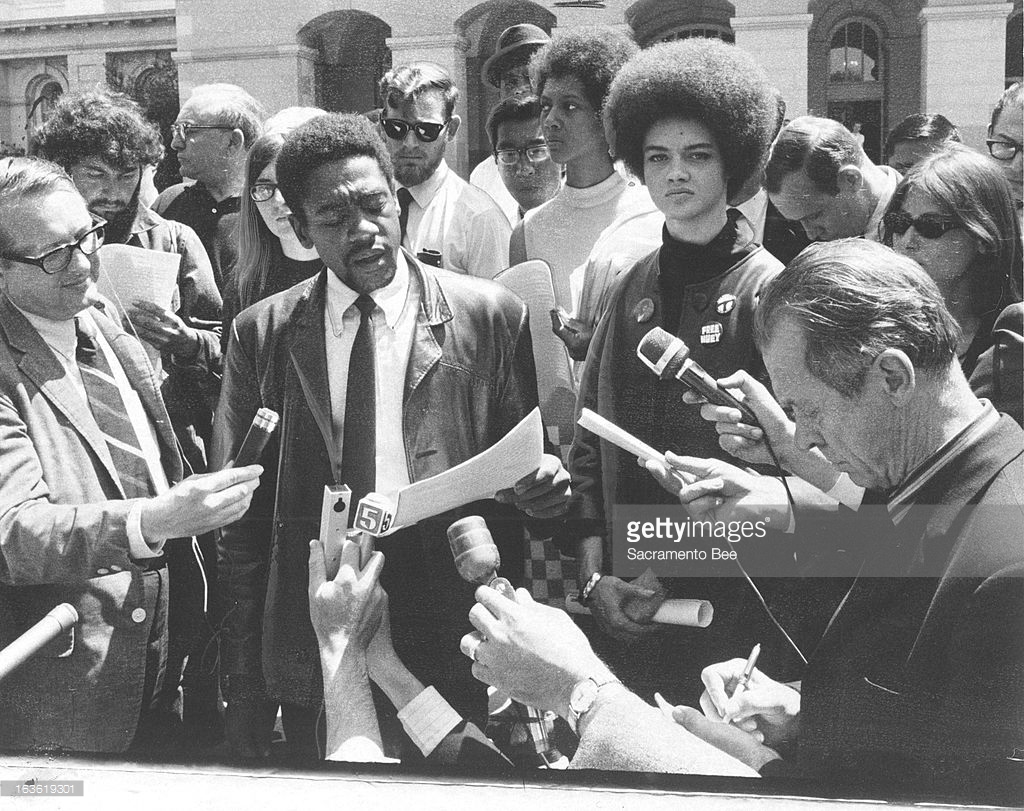 Black Panther Bobby Seale, in a file image in Sacramento, California, while running for a State Assembly seat in May 1968. He's joined by Kathleen Cleaver, wife of Panther leader Eldridge Cleaver, who was shot during a shootout with Oakland police early in 1968.