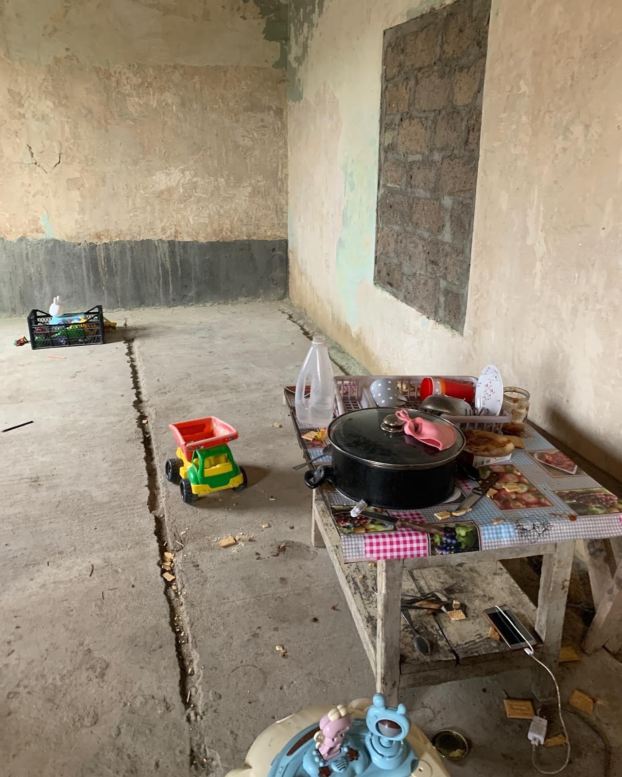 A picture containing ground, trash, dirty, construction

Description automatically generated