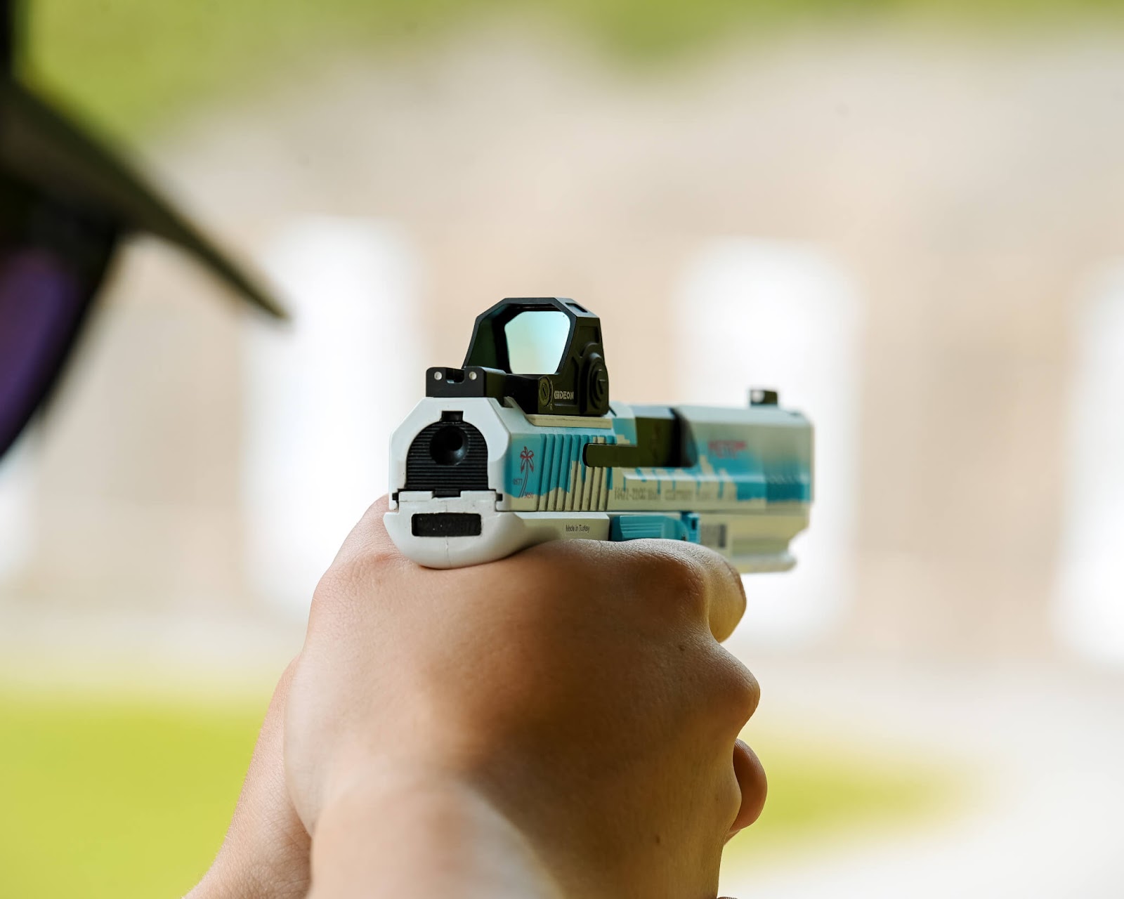 Gideon Optics red dot sight mounted on a pistol