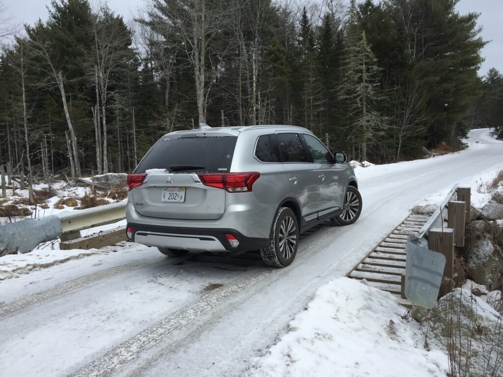 At 185 inches, the Outlander is slightly longer than most compact crossovers, with space for a third-row seat. Photo by Tim Plouff. Location: Green Lake Road, Ellsworth.