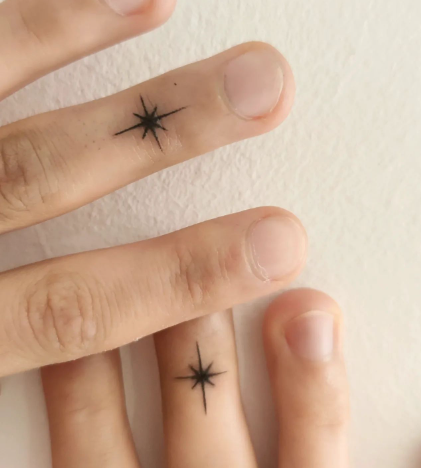 On Tips Star Tattoo