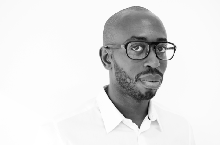 Black and white photo of Koyé Oyedeji, Senior Curriculum Writer
