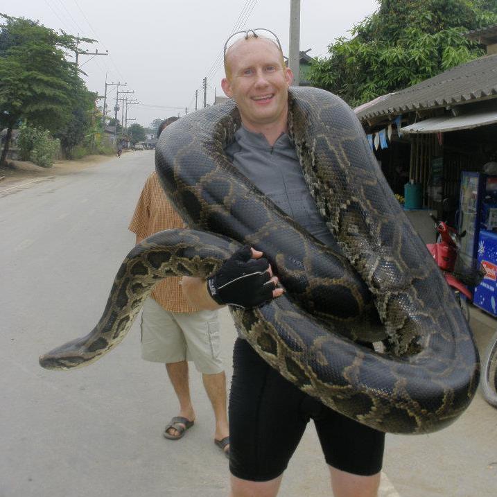 John Knauss with a friendly python. 
