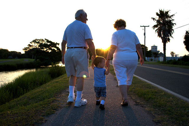 Grandparents with small boy off for a walk - retirement living - motherdistracted.co.uk