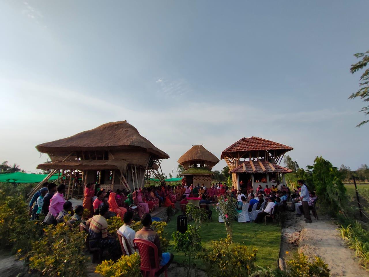 A group of people sitting outside

Description automatically generated with low confidence