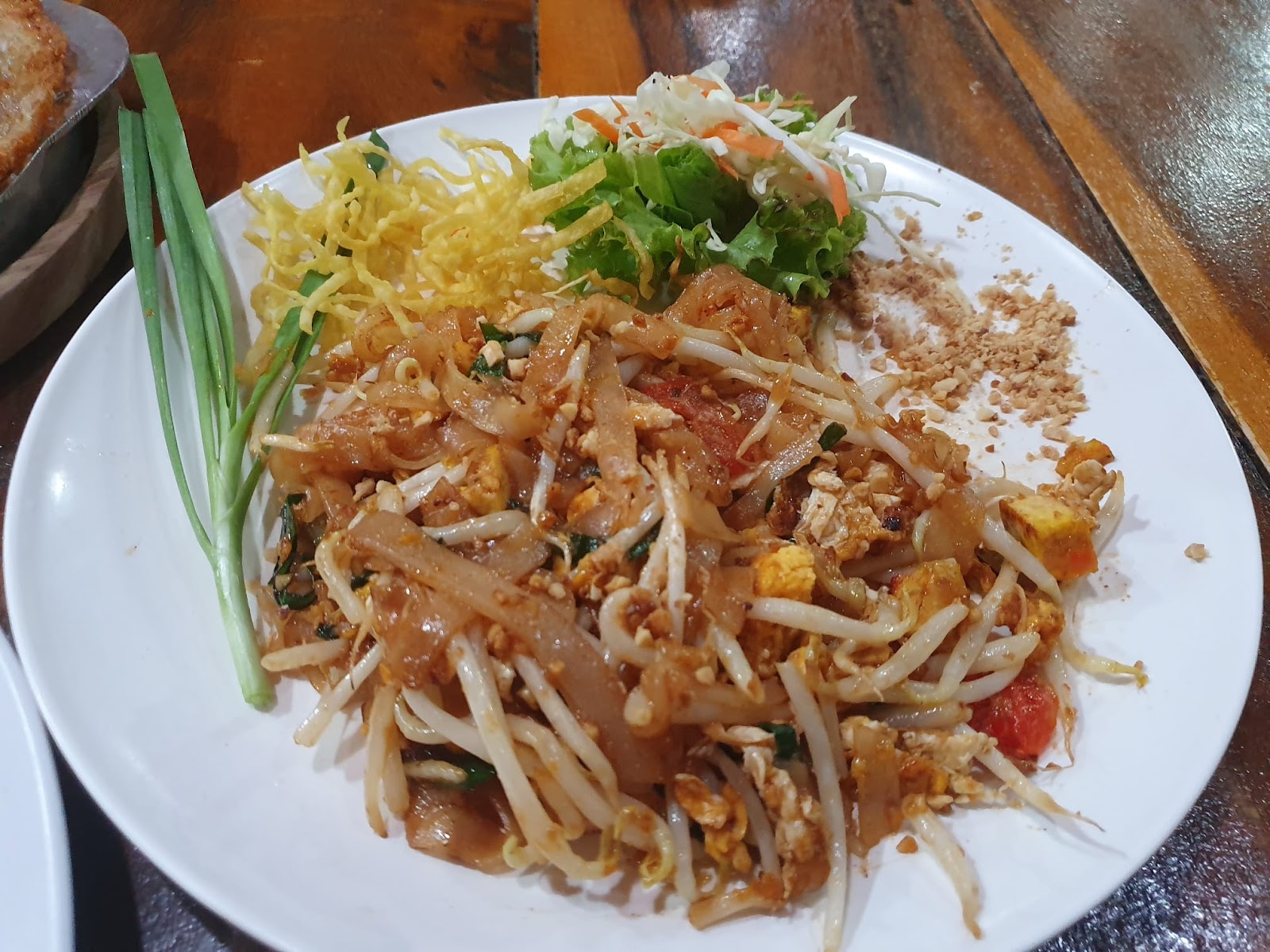 half eaten pad thai from Northeast restaurant in Bangkok