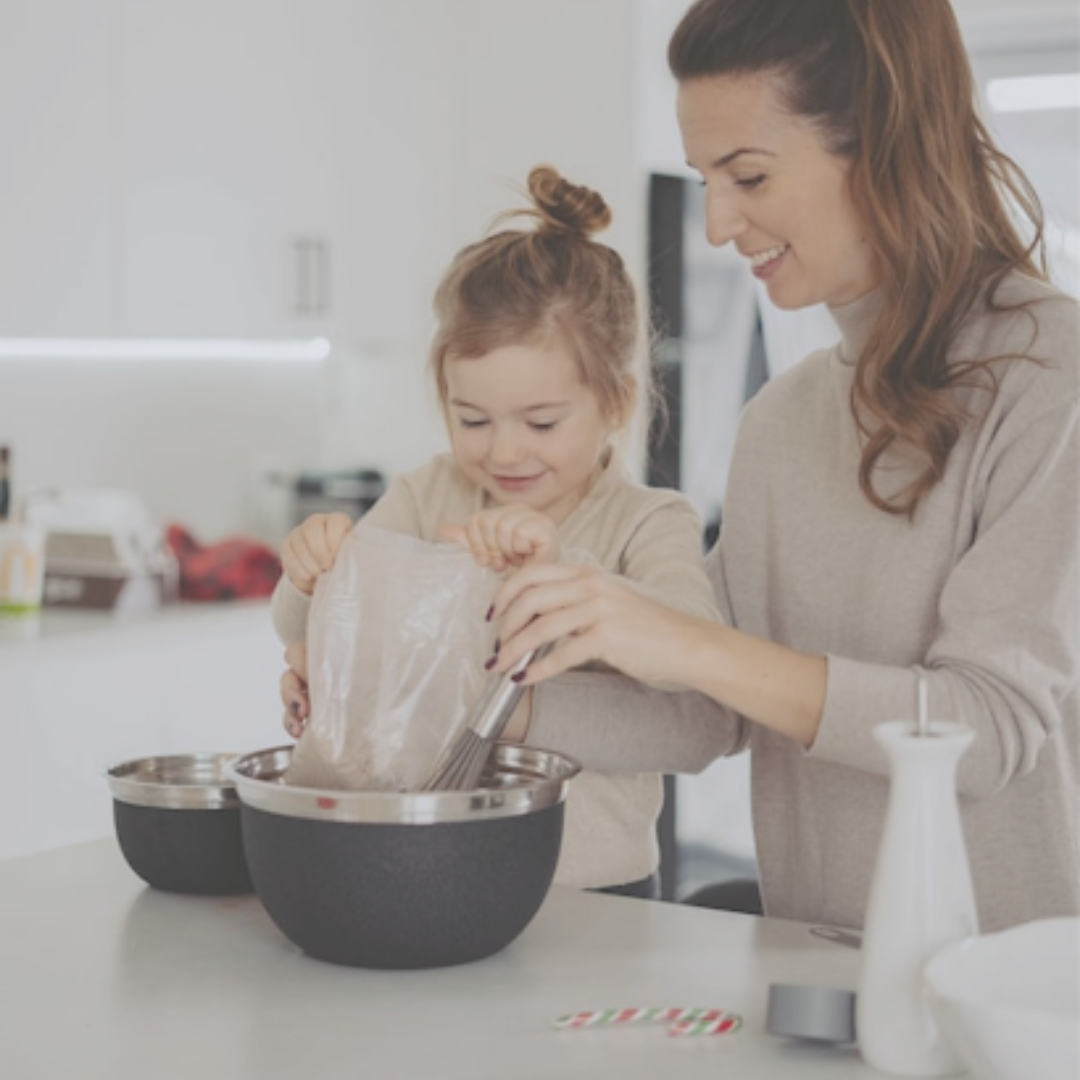  A mother and daughter baking a cake