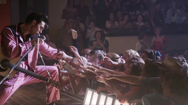 Austin Butler performing onstage as Elvis Presley in "Elvis"