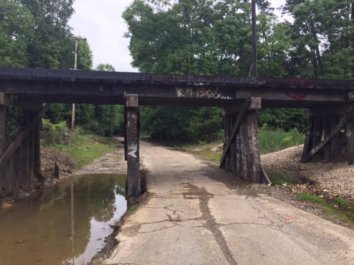 Road under railroad tracks