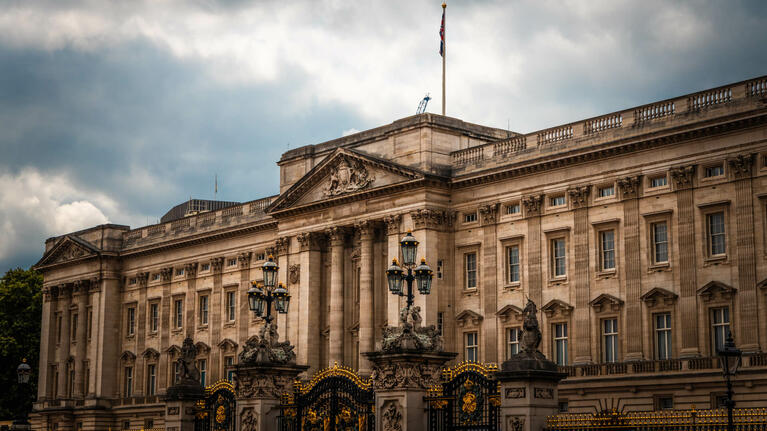 The exterior of Buckingham Palace from The Mall